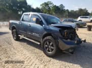 ✅ 2014 Nissan Titan Pro-4X • VIN: 1N6AA0EC3EN519605 • Lot: 69623895. Listed on Copart with 70,311 mi. Free auction sales archive from the USA and detailed vehicle history report at DreamBid. Image 4.