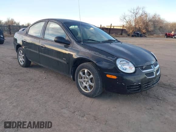 2005 Dodge Neon SXT z VIN 1B3ES56C75D123066, wystawiony jako IAAI lot #41029820 z przebiegiem 179 305 mil mil oraz . Historia ofert i sprzedaży dostępna na DreamBid. Obrazek 1.