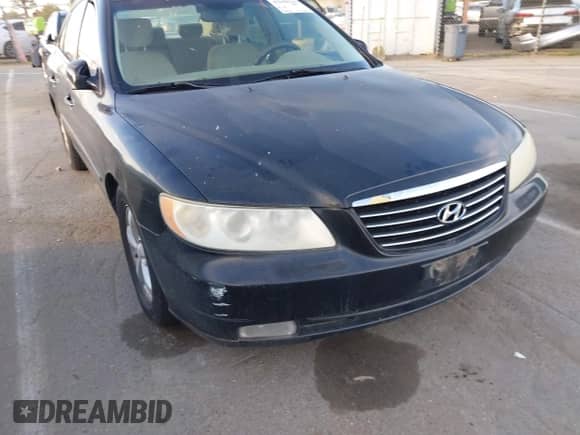 2006 Hyundai Azera SE with VIN KMHFC46F56A114031, listed as a IAAI auction lot 43610131 with 119,506 mi miles and . Bid and sale history available at DreamBid. Image 13.