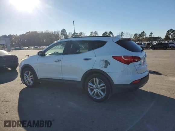 ✅ 2014 Hyundai Santa Fe • VIN: 5XYZU3LA1EG161122 • Lot: 93245155. Listed on Copart with 179,433 mi. Free auction sales archive from the USA and detailed vehicle history report at DreamBid. Image 2.
