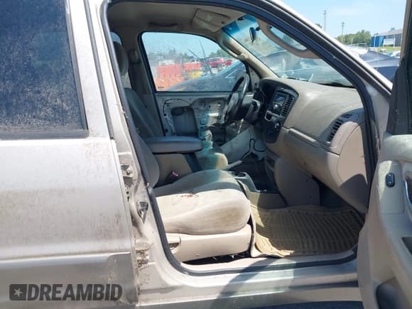 ✅ 2002 Mazda Tribute LX • VIN: 4F2YU09102KM42299 • Lot: 42927346. Wystawiony na IAAI z przebiegiem 283 827 mil. Bezpłatny archiwum sprzedaży aukcyjnych z USA i szczegółowy raport historii pojazdu na DreamBid. Zdjęcie 5.