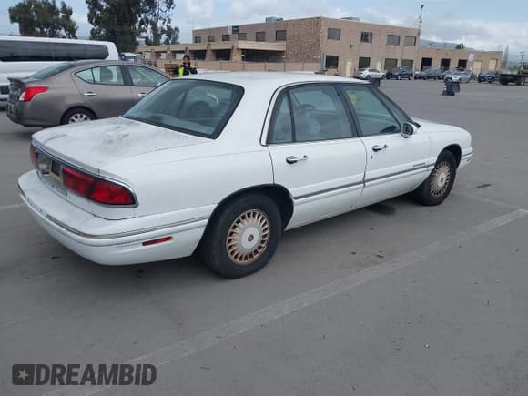 ✅ 1998 Buick LeSabre Limited • VIN: 1G4HR52K2WH500817 • Lot: 41911170. Listed on IAAI with 209,551 mi. Free auction sales archive from the USA and detailed vehicle history report at DreamBid. Image 4.