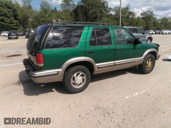 1999 Chevrolet Blazer LT with VIN 1GNDT13W3X2137471, listed as a IAAI auction lot 42847738 with 97,418 mi miles and . Bid and sale history available at DreamBid. Image 4.