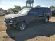 2013 Chevrolet Suburban LT with VIN 1GNSKJE79DR150003, listed as a Copart auction lot 80715615 with 164,810 mi miles and Salvage title. Bid and sale history available at DreamBid. Image 1.