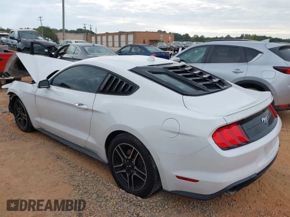 ✅ 2021 Ford Mustang EcoBoost • VIN: 1FA6P8TH9M5101140 • Lot: 43309485. Listed on IAAI with 69,861 mi. Free auction sales archive from the USA and detailed vehicle history report at DreamBid. Image 3.