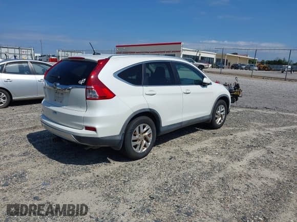 ✅ 2015 Honda CR-V EX-L • VIN: 5J6RM3H71FL016790 • Lot: 43177841. Listed on IAAI with 220,079 mi. Free auction sales archive from the USA and detailed vehicle history report at DreamBid. Image 4.