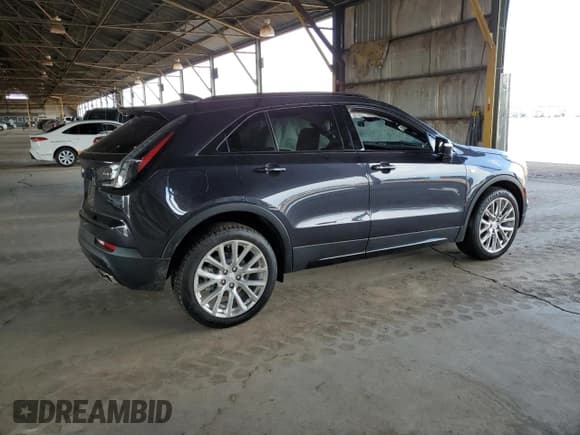 ✅ 2023 Cadillac XT4 AWD Sport • VIN: 1GYFZFR45PF103280 • Lot: 71688255. Listed on Copart with 33,221 mi. Free auction sales archive from the USA and detailed vehicle history report at DreamBid. Image 3.