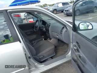 2002 Hyundai Accent GL z VIN KMHCG45C52U378454, wystawiony jako IAAI lot #41418653 z przebiegiem 173 564 mil mil oraz . Historia ofert i sprzedaży dostępna na DreamBid. Obrazek 5.