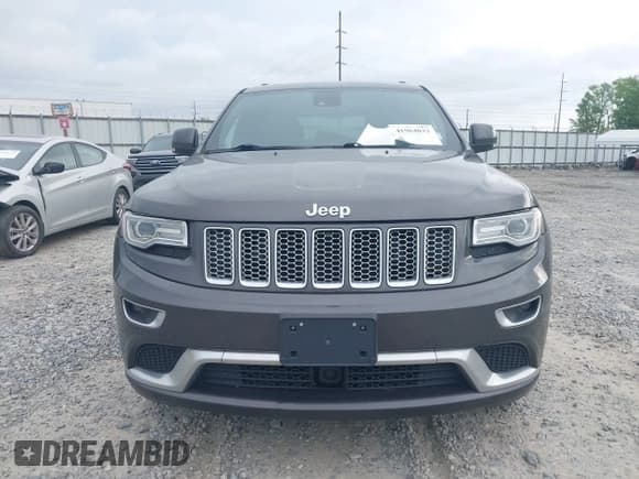 ✅ 2015 Jeep Grand Cherokee Summit • VIN: 1C4RJEJG2FC816289 • Lot: 41964032. Listed on IAAI with 106,000 mi. Free auction sales archive from the USA and detailed vehicle history report at DreamBid. Image 12.