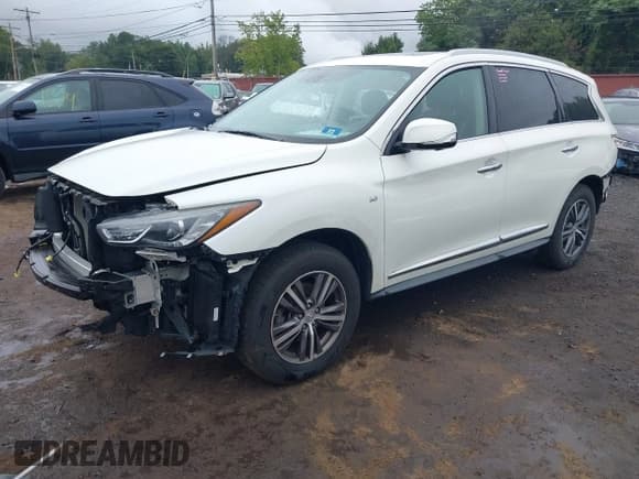 ✅ 2018 Infiniti QX60 • VIN: 5N1DL0MM3JC522526 • Lot: 43021460. Listed on IAAI with 100,199 mi. Free auction sales archive from the USA and detailed vehicle history report at DreamBid. Image 21.