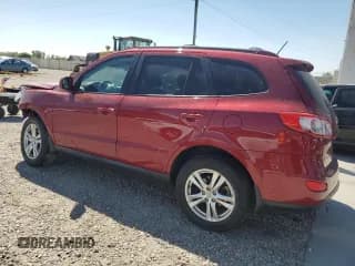 ✅ 2012 Hyundai Santa Fe SE • VIN: 5XYZHDAG1CG138065 • Lot: 70289844. Listed on Copart with 144,549 mi. Free auction sales archive from the USA and detailed vehicle history report at DreamBid. Image 2.