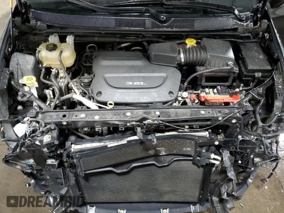 ✅ 2018 Chrysler Pacifica Touring L Plus • VIN: 2C4RC1EG7JR157252 • Lot: 81389925. Listed on Copart with 125,569 mi. Free auction sales archive from the USA and detailed vehicle history report at DreamBid. Image 12.