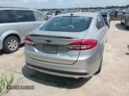 ✅ 2017 Ford Fusion Hybrid Titanium • VIN: 3FA6P0RU1HR317556 • Lot: 42549706. Listed on IAAI with 77,744 mi. Free auction sales archive from the USA and detailed vehicle history report at DreamBid. Image 16.