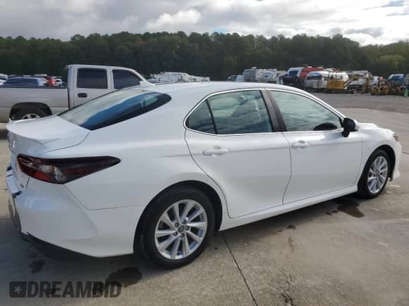 2023 Toyota Camry LE with VIN 4T1C11AKXPU721540, listed as a Copart auction lot 86862045 with 84,821 mi miles and Clean title. Bid and sale history available at DreamBid. Image 3.