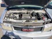 ✅ 1999 GMC Safari • VIN: 1GKEL19W6XB510642 • Lot: 65642155. Wystawiony na Copart z przebiegiem 111 424 mil. Bezpłatny archiwum sprzedaży aukcyjnych z USA i szczegółowy raport historii pojazdu na DreamBid. Zdjęcie 12.