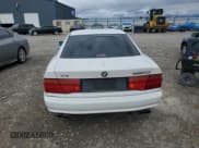 ✅ 1993 BMW 8 Series • VIN: WBAEG2326PCB74898 • Lot: 57274865. Wystawiony na Copart z przebiegiem 137 968 mil. Bezpłatny archiwum sprzedaży aukcyjnych z USA i szczegółowy raport historii pojazdu na DreamBid. Zdjęcie 8.