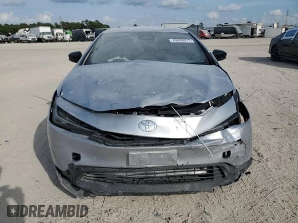 2024 Toyota Prius LE с VIN JTDACAAU6R3026505, выставлен на аукционе Copart как лот 89888075 с пробегом 40 588 миль миль и Списание • Salvage title. История ставок и продаж доступна на DreamBid. Изображение 5.