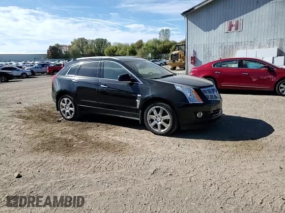 ✅ 2012 Cadillac SRX Performance Collection • VIN: 3GYFNEE36CS530962 • Лот: 82447995. Опубликован ранее на Copart с пробегом 80 152 миль. Бесплатный доступ к архиву аукционных продаж из США и подробный отчёт об истории автомобиля на DreamBid. Изображение 14.