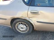 ✅ 2001 Chevrolet Impala • VIN: 2G1WF55E619146347 • Lot: 42792452. Wystawiony na IAAI z przebiegiem 156 009 mil. Bezpłatny archiwum sprzedaży aukcyjnych z USA i szczegółowy raport historii pojazdu na DreamBid. Zdjęcie 14.