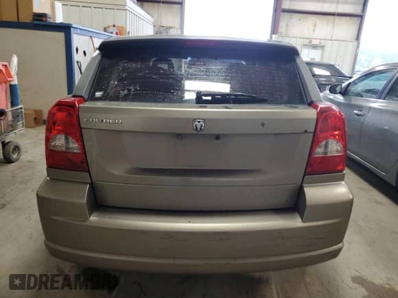 2008 Dodge Caliber SE с VIN 1B3HB28B28D696607, выставлен на аукционе Copart как лот 77379713 с пробегом 74 205 миль миль и Списание • Salvage title. История ставок и продаж доступна на DreamBid. Изображение 6.