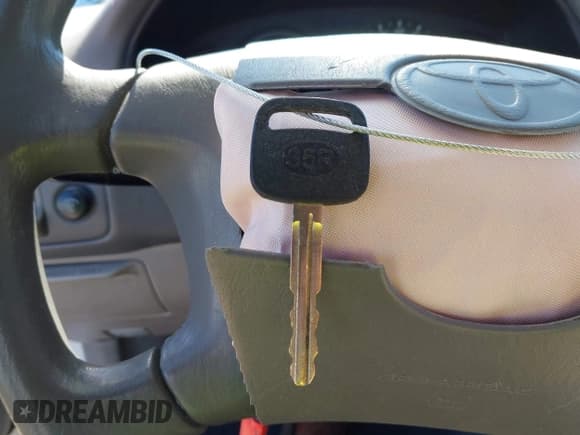 ✅ 1999 Toyota Corolla VE • VIN: 1NXBR12E5XZ199901 • Lot: 42769569. Listed on IAAI with 82,611 mi. Free auction sales archive from the USA and detailed vehicle history report at DreamBid. Image 11.