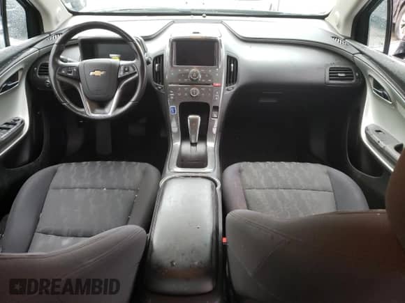 2015 Chevrolet Volt z VIN 1G1RC6E41FU105430, wystawiony jako Copart lot #76778003 z przebiegiem Nie podano mil oraz . Historia ofert i sprzedaży dostępna na DreamBid. Obrazek 8.