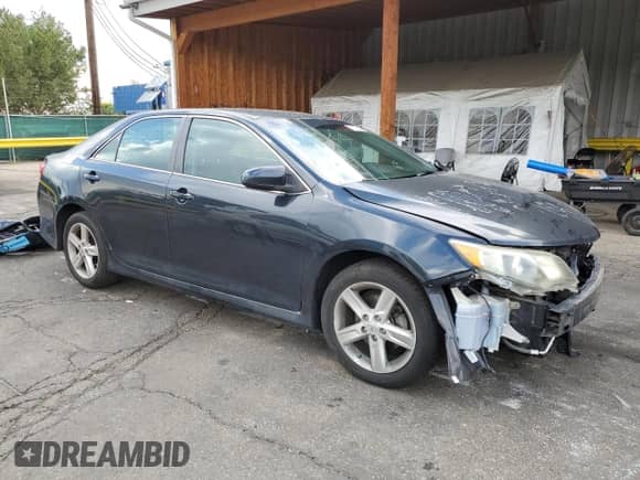 2014 Toyota Camry L with VIN 4T1BF1FK4EU304191, listed as a Copart auction lot 70778585 with 176,301 mi miles and Salvage title. Bid and sale history available at DreamBid. Image 4.