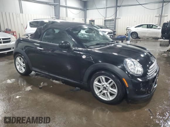 ✅ 2013 MINI Roadster • VIN: WMWSY1C52DT625144 • Lot: 43969085. Listed on Copart with 35,090 mi. Free auction sales archive from the USA and detailed vehicle history report at DreamBid. Image 4.