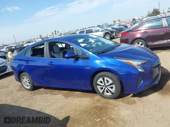 ✅ 2016 Toyota Prius Four • VIN: JTDKARFU0G3527713 • Lot: 43130413. Listed on IAAI with 83,171 mi. Free auction sales archive from the USA and detailed vehicle history report at DreamBid. Image 13.