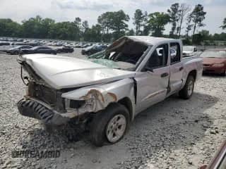 2008 Dodge Dakota SLT z VIN 1D7HE48K18S514754, wystawiony jako Copart lot #52281525 z przebiegiem Nie podano mil oraz Czysty tytuł • Clean title. Historia ofert i sprzedaży dostępna na DreamBid. Obrazek 1.