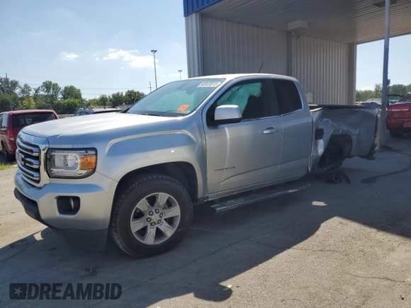 ✅ 2015 GMC Canyon 4WD SLE • VIN: 1GTH6BE3XF1147977 • Lot: 68933815. Listed on Copart with 76,935 mi. Free auction sales archive from the USA and detailed vehicle history report at DreamBid. Image 1.