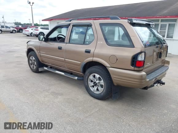 ✅ 2000 Isuzu Rodeo S • VIN: 4S2CK58W3Y4316966 • Lot: 42003598. Listed on IAAI with 106,187 mi. Free auction sales archive from the USA and detailed vehicle history report at DreamBid. Image 3.