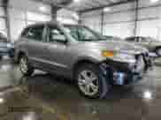 2012 Hyundai Santa Fe Limited с VIN 5XYZKDAGXCG152385, выставлен на аукционе Copart как лот 63775244 с пробегом 149 243 миль миль и Списание • Salvage title. История ставок и продаж доступна на DreamBid. Изображение 4.