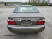 ✅ 2002 Mazda 626 LX • VIN: 1YVGF22D225285499 • Lot: 53693055. Listed on Copart with 144,812 mi. Free auction sales archive from the USA and detailed vehicle history report at DreamBid. Image 6.