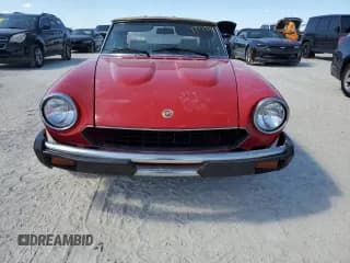 ✅ 1979 FIAT 124 Spider • VIN: 124CS20144522 • Лот: 77779724. Опубликован ранее на Copart с пробегом 651 миль. Бесплатный доступ к архиву аукционных продаж из США и подробный отчёт об истории автомобиля на DreamBid. Изображение 5.