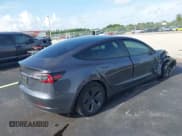 ✅ 2023 Tesla Model 3 • VIN: 5YJ3E1EA5PF577060 • Lot: 43115886. Listed on IAAI with 28,320 mi. Free auction sales archive from the USA and detailed vehicle history report at DreamBid. Image 4.