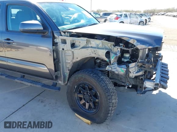 ✅ 2023 Toyota Tacoma SR • VIN: 3TYCZ5AN1PT146719 • Lot: 41406963. Listed on IAAI with 19,735 mi. Free auction sales archive from the USA and detailed vehicle history report at DreamBid. Image 6.