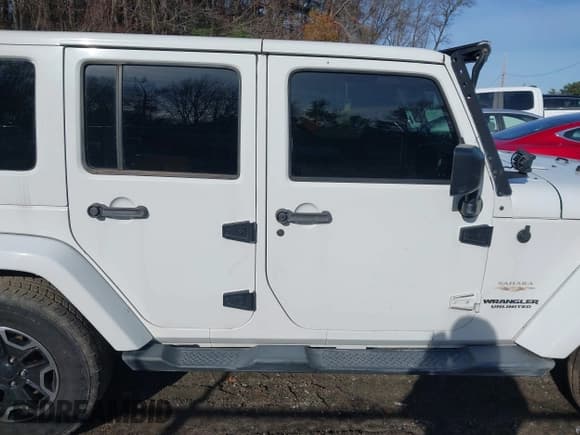 ✅ 2013 Jeep Wrangler Unlimited Sahara • VIN: 1C4BJWEG9DL509006 • Lot: 43802917. Listed on IAAI with 142,933 mi. Free auction sales archive from the USA and detailed vehicle history report at DreamBid. Image 13.