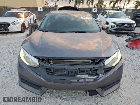 ✅ 2017 Honda Civic LX • VIN: 19XFC2F59HE017124 • Lot: 94428665. Wystawiony na Copart z przebiegiem 141 765 mil. Bezpłatny archiwum sprzedaży aukcyjnych z USA i szczegółowy raport historii pojazdu na DreamBid. Zdjęcie 5.