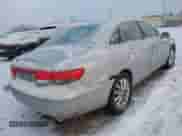 2006 Hyundai Azera SE z VIN KMHFC46F46A093575, wystawiony jako IAAI lot #41259753 z przebiegiem 164 453 mil mil oraz . Historia ofert i sprzedaży dostępna na DreamBid. Obrazek 4.