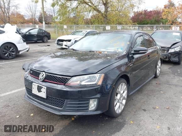 ✅ 2014 Volkswagen Jetta GLI • VIN: 3VW5T7AJ6EM258246 • Lot: 43543504. Listed on IAAI with 124,950 mi. Free auction sales archive from the USA and detailed vehicle history report at DreamBid. Image 2.