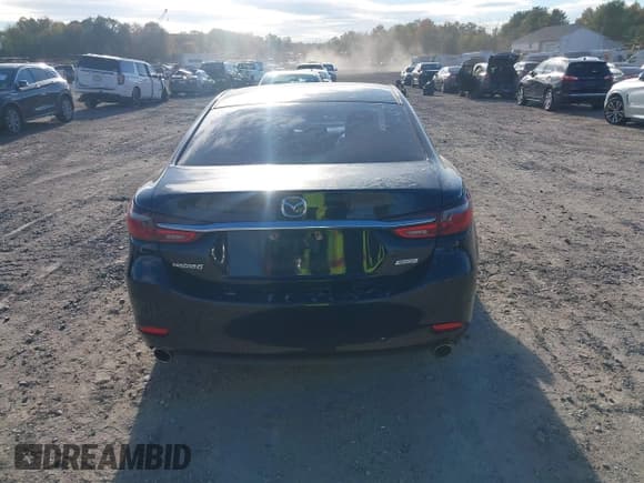 ✅ 2018 Mazda 6 Touring • VIN: JM1GL1VM9J1313051 • Lot: 43428814. Wystawiony na IAAI z przebiegiem 119 461 mil. Bezpłatny archiwum sprzedaży aukcyjnych z USA i szczegółowy raport historii pojazdu na DreamBid. Zdjęcie 16.