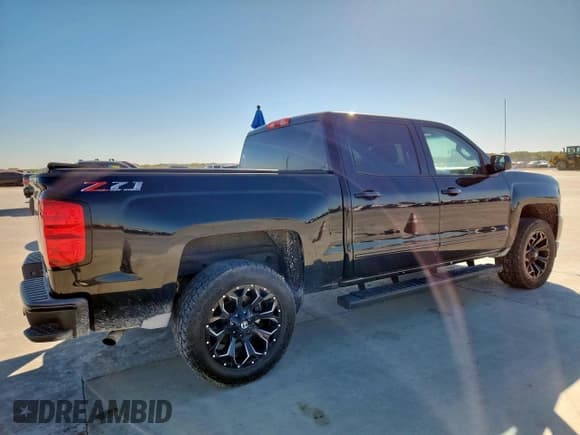 ✅ 2018 Chevrolet Silverado 1500 LT • VIN: 3GCUKREC5JG164974 • Лот: 90520345. Опубликован ранее на Copart с пробегом 171 279 миль. Бесплатный доступ к архиву аукционных продаж из США и подробный отчёт об истории автомобиля на DreamBid. Изображение 3.