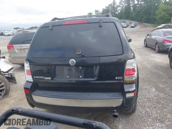 2009 Mercury Mariner Premier with VIN 4M2CU97749KJ15320, listed as a IAAI auction lot 42450753 with 182,172 mi miles and . Bid and sale history available at DreamBid. Image 16.