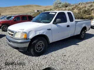 ✅ 1998 Ford F-150 • VIN: 1FTZX1720WKA20813 • Lot: 63852215. Listed on Copart with 215,729 mi. Free auction sales archive from the USA and detailed vehicle history report at DreamBid. Image 1.