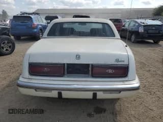 ✅ 1990 Buick Riviera • VIN: 1G4EZ13C7LU400525 • Lot: 71667574. Wystawiony na Copart z przebiegiem 226 125 mil. Bezpłatny archiwum sprzedaży aukcyjnych z USA i szczegółowy raport historii pojazdu na DreamBid. Zdjęcie 6.