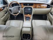 ✅ 2005 Jaguar XJ 8 LWB • VIN: SAJWA79C65SG34572 • Лот: 93790045. Опубликован ранее на Copart с пробегом 148 958 миль. Бесплатный доступ к архиву аукционных продаж из США и подробный отчёт об истории автомобиля на DreamBid. Изображение 8.