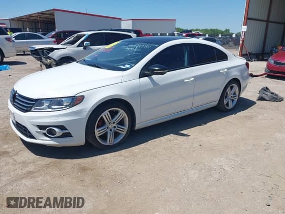 ✅ 2016 Volkswagen CC Executive • VIN: WVWRP7AN8GE518666 • Lot: 42080281. Listed on IAAI with 107,697 mi. Free auction sales archive from the USA and detailed vehicle history report at DreamBid. Image 2.