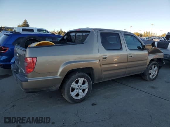 ✅ 2010 Honda Ridgeline RTL • VIN: 5FPYK1F58AB009402 • Lot: 90696955. Listed on Copart with Not provided. Free auction sales archive from the USA and detailed vehicle history report at DreamBid. Image 3.