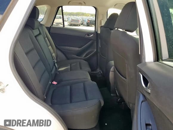 ✅ 2016 Mazda CX-5 Touring • VIN: JM3KE2CY2G0607428 • Лот: 91684385. Опубликован ранее на Copart с пробегом 130 111 миль. Бесплатный доступ к архиву аукционных продаж из США и подробный отчёт об истории автомобиля на DreamBid. Изображение 11.